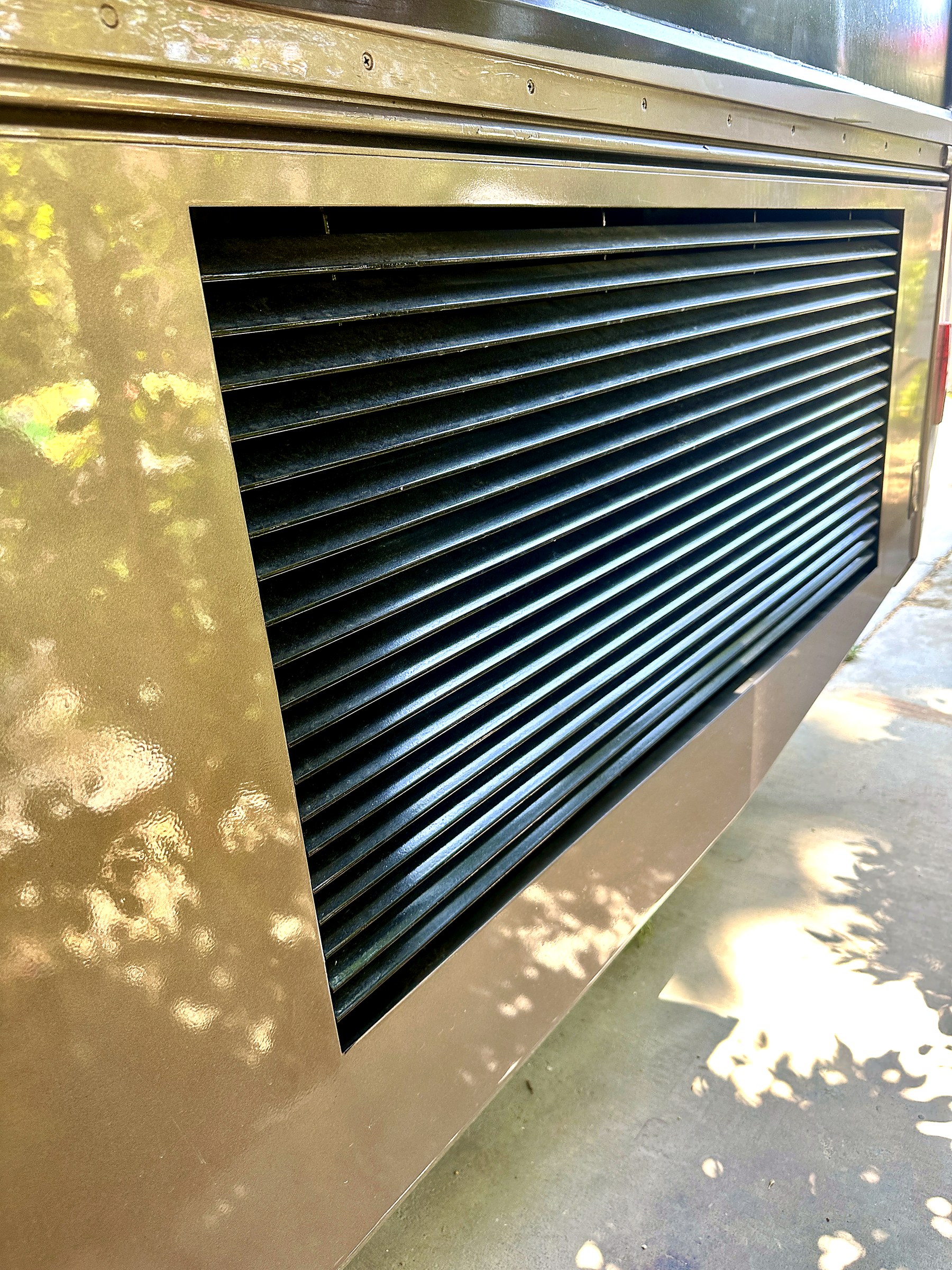 2004 Fleetwood Revolution 40C — Storage & Service Bays detail shot