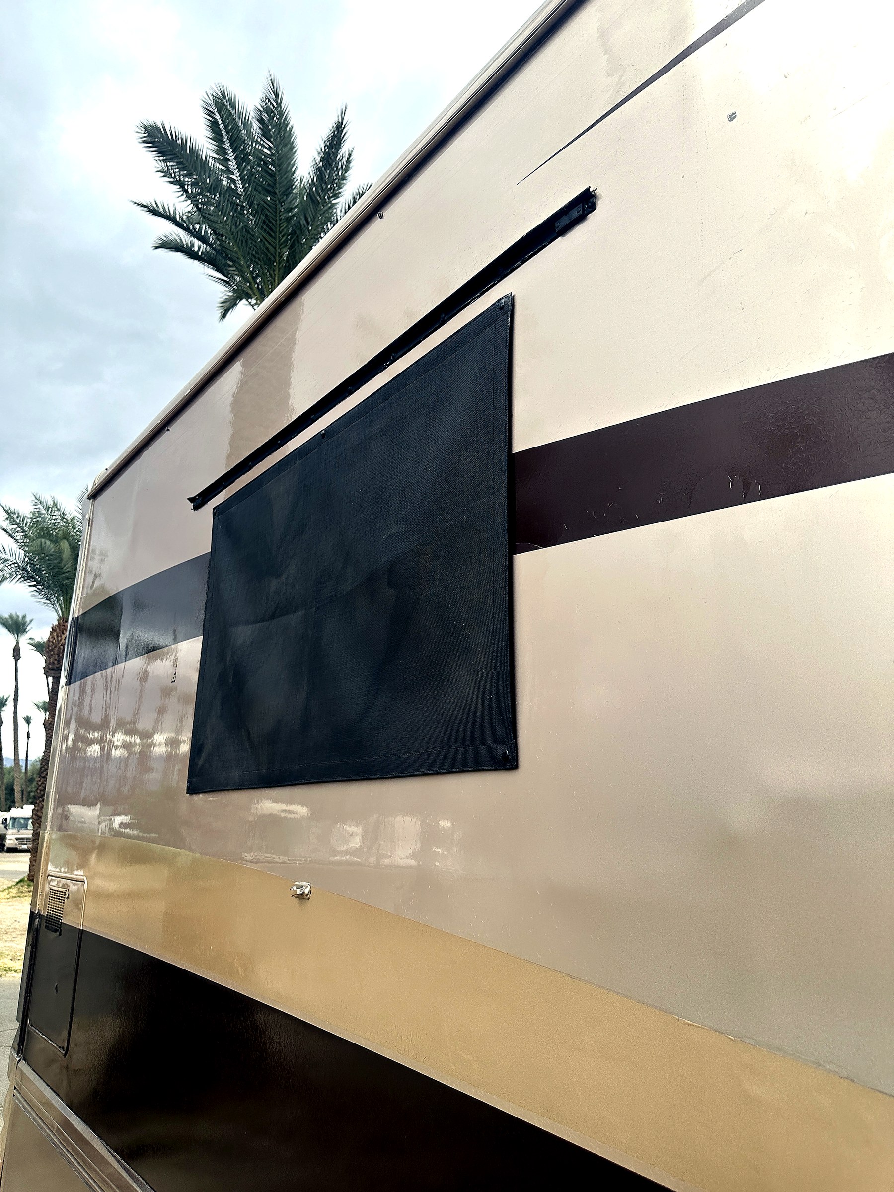 2004 Fleetwood Revolution 40C — Storage & Service Bays detail shot