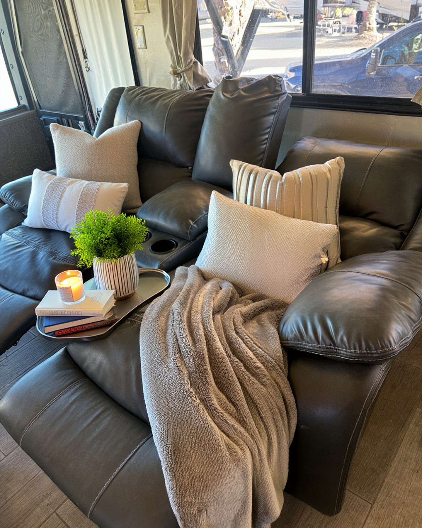 2004 Fleetwood Revolution 40C — Wide view of the salon with twin recliners — Palm Desert CA