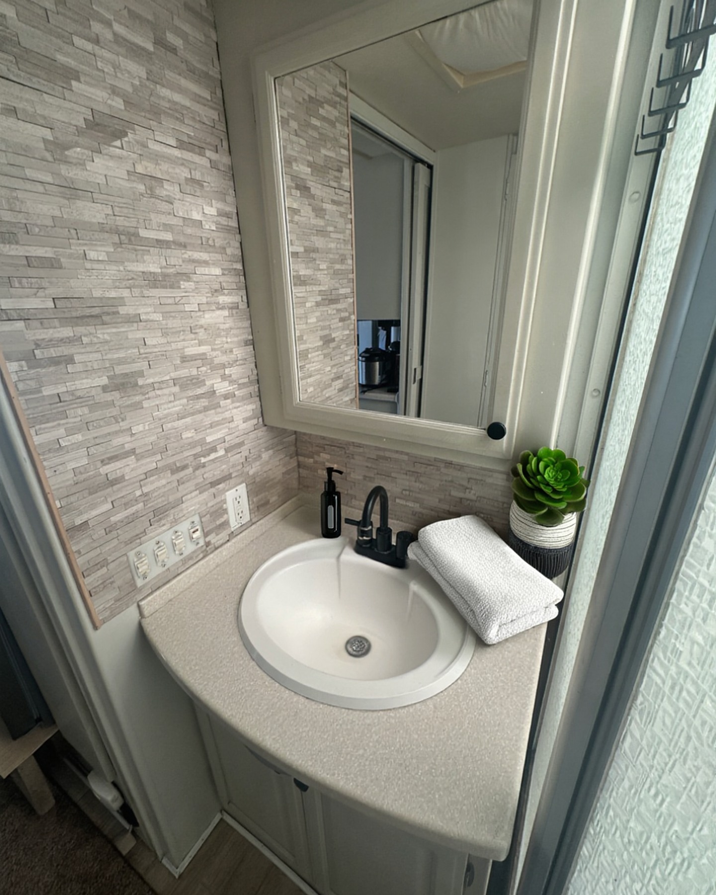 2004 Fleetwood Revolution 40C — Bathroom vanity with tile backsplash — Palm Desert CA