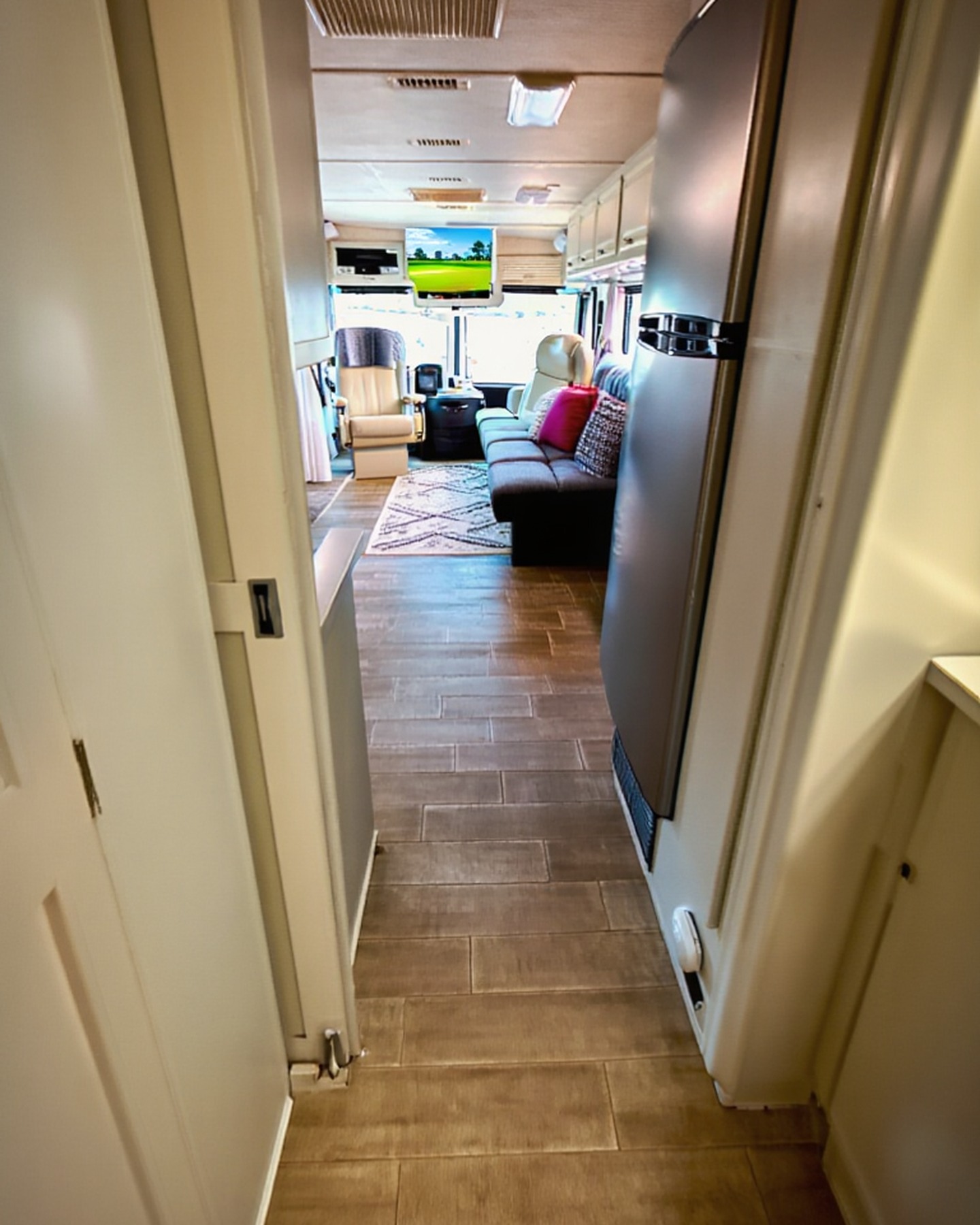 2004 Fleetwood Revolution 40C — Hallway view back toward the salon — Palm Desert CA