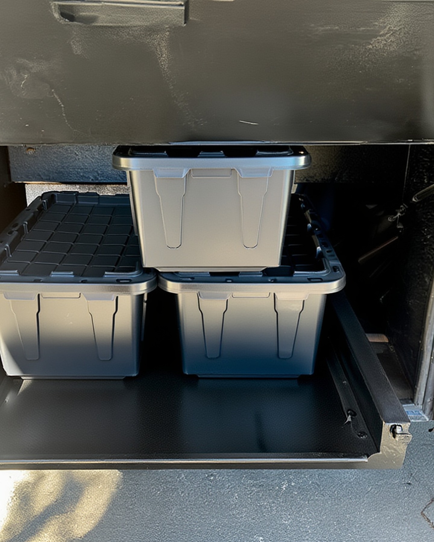 2004 Fleetwood Revolution 40C — Storage bay with organized bins on slide tray — Palm Desert CA